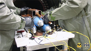 Employees at CMA using an EDS system to safely and securely deactivate and destroy chemical weapons that have been recovered
